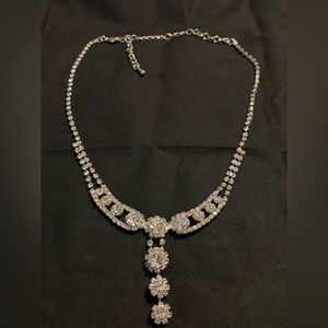 18” long necklace with crystals.